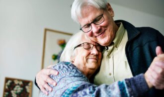 An image of good mental health with an intimate moment between two elderly people