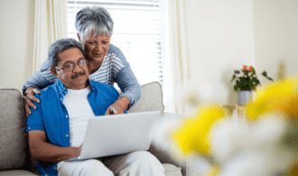 A senior couple caregiving and using technology, Memory Care, Montrose, Colorado
